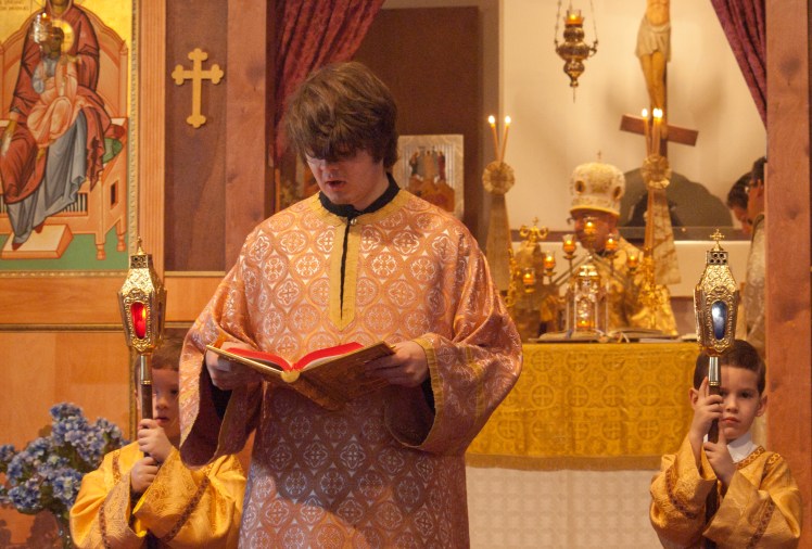 Reader Seraphim Hamilton giving his first reading of the Epistle